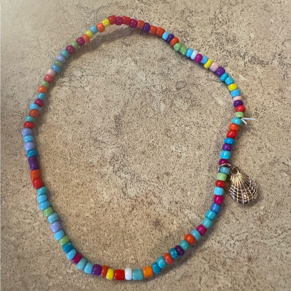 - - Multicolor beaded boho anklet with gold shell NWT. Stretchy